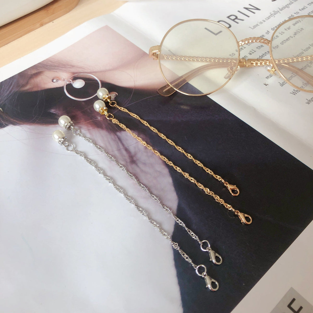 Boucles d'oreilles pendantes élégantes avec perles