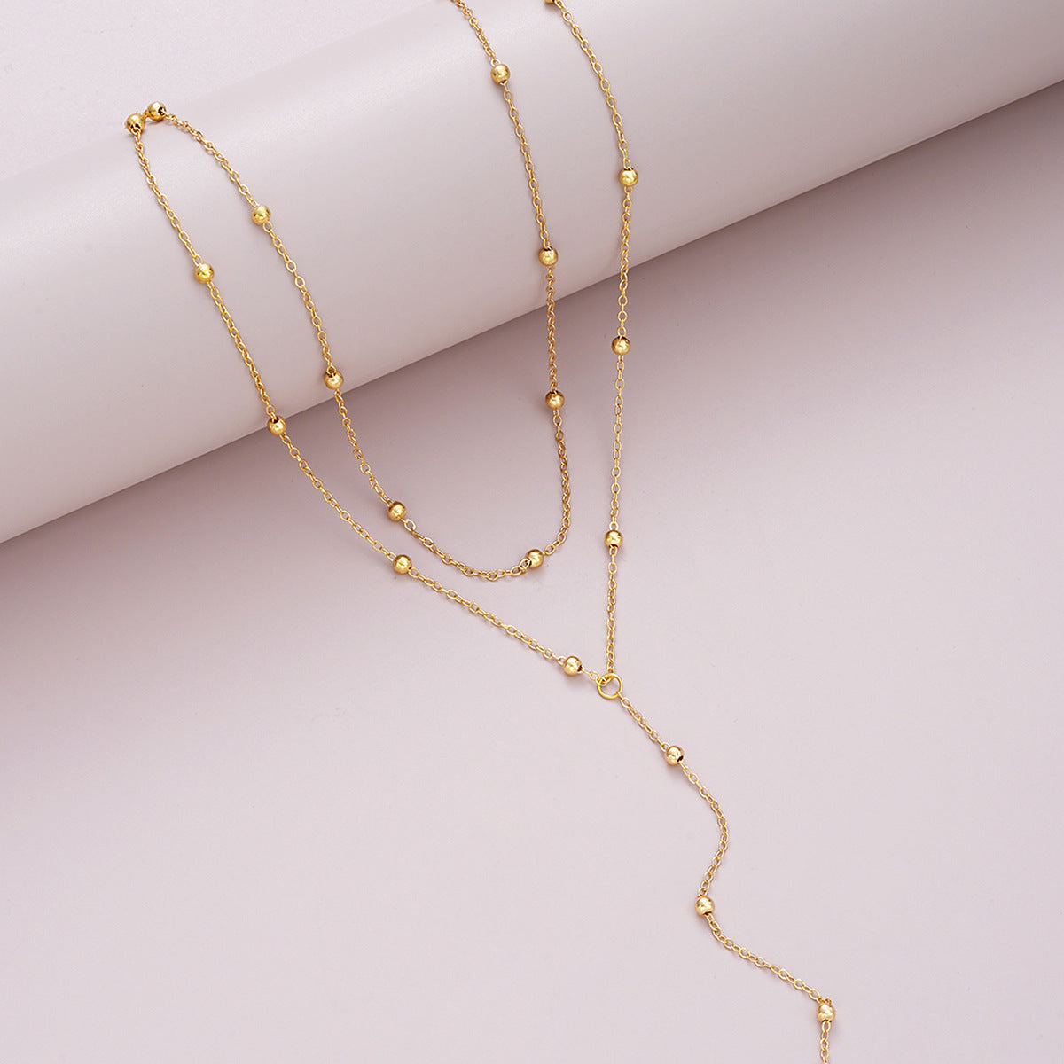Collier lariat multicouche