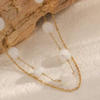 Collier pour femme avec pierres transparentes et chaîne à maillons