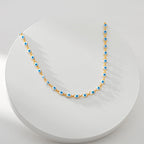 Collier charme œil