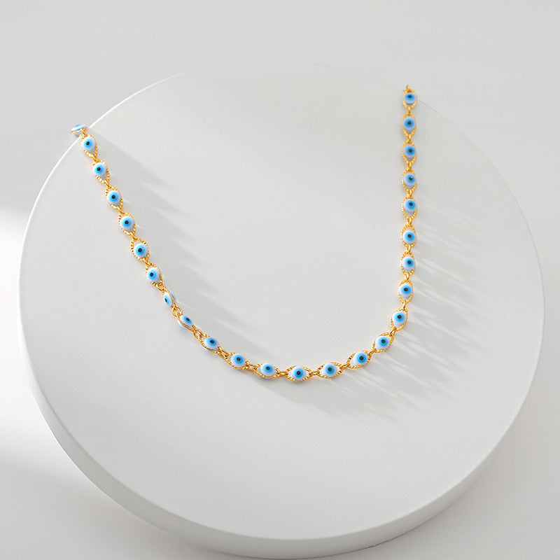 Collier charme œil