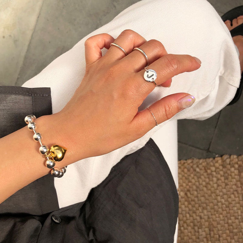 Bracelet cœur et perles pour femme