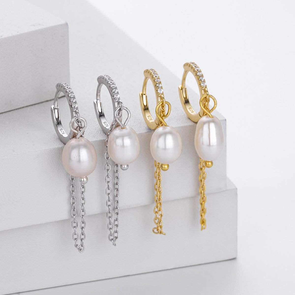 Boucles d'oreilles pendantes avec perle