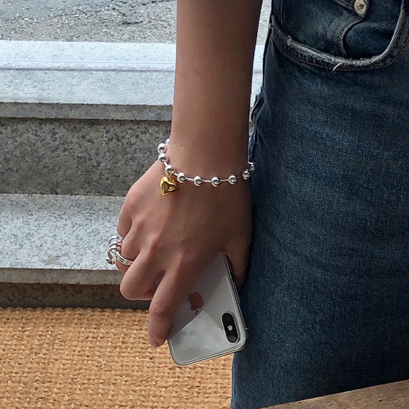 Bracelet cœur et perles pour femme
