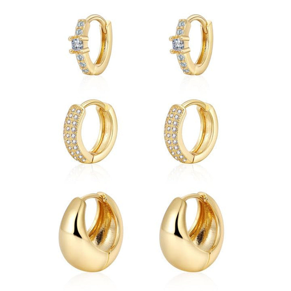 Boucles d'oreilles pendantes dorées pour femme au design goutte moderne