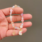 Bracelet fantaisie avec perles en verre colorées et pendentif