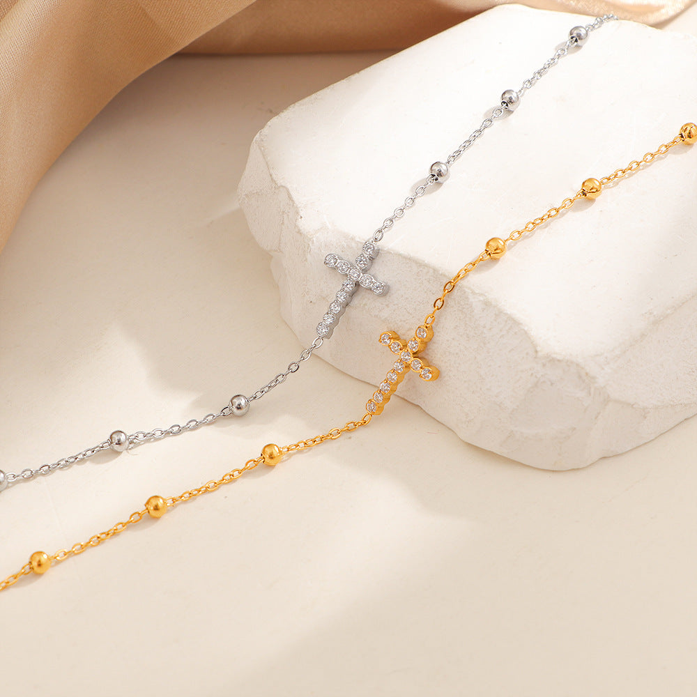 Bracelet pour femme réglable avec breloque croix