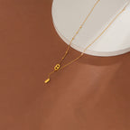 Collier minimaliste à pendentif superposé pour femme