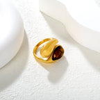 Bague pour femme design incurvé innovant et perle