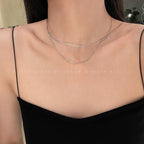 Collier superposé à chaîne argentée élégante