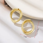 Clous d'oreilles pour femme design tressé artistique