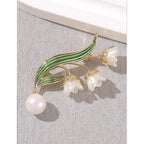 Broche fleur élégante avec pendentif perle