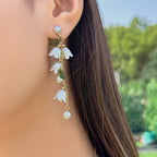 Boucles d'oreilles pour femme avec pendentifs floraux et perles