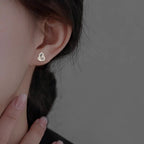 Clous d'oreilles pour femme design cœur avec accents étincelants