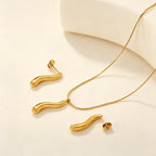 Parure de bijoux pour femme avec pendentif élégant et boucles d'oreilles