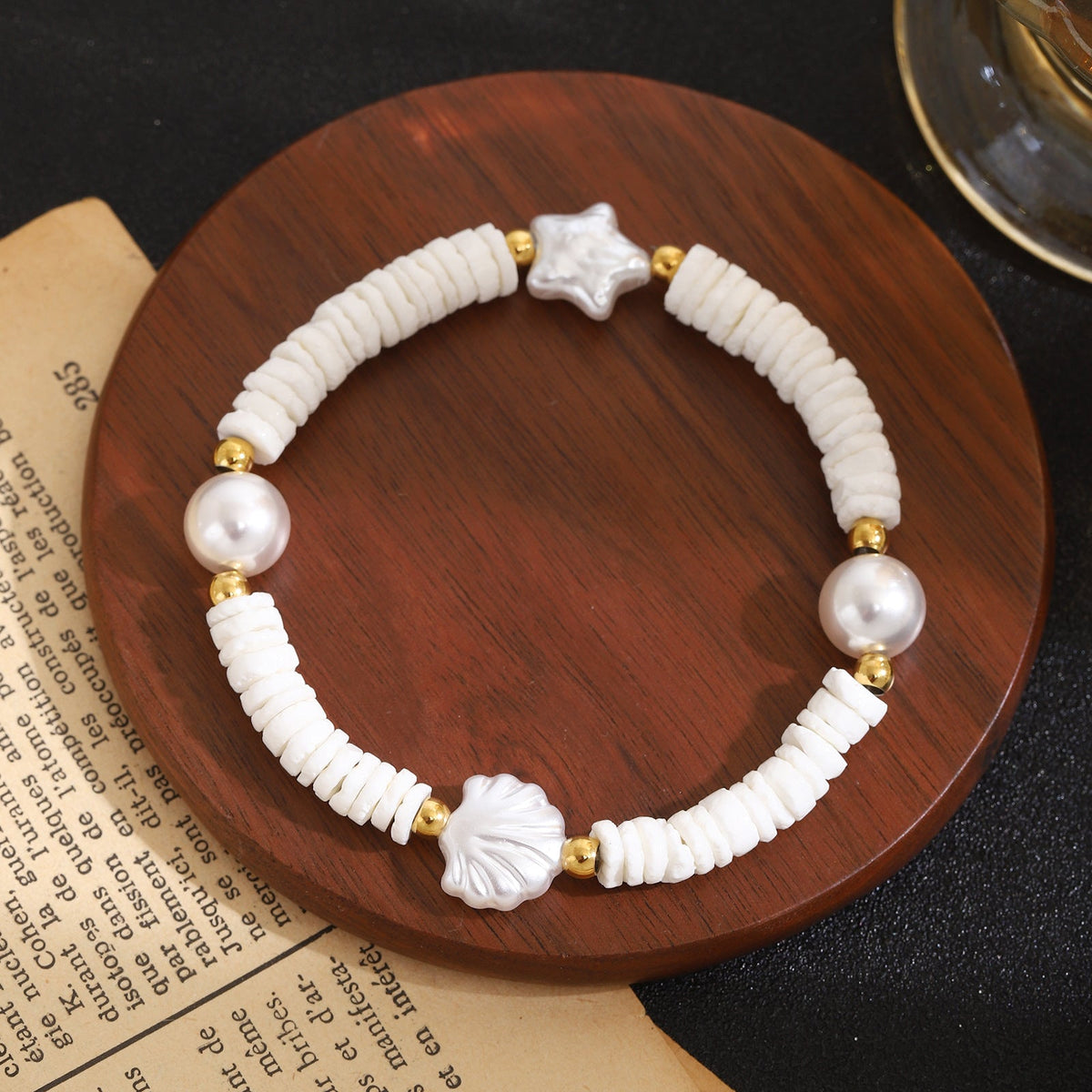 Bracelet de perles pour femme avec motif coquillage classique