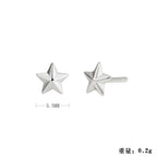 Boucles d'oreilles clous pour femme design pointes moderne