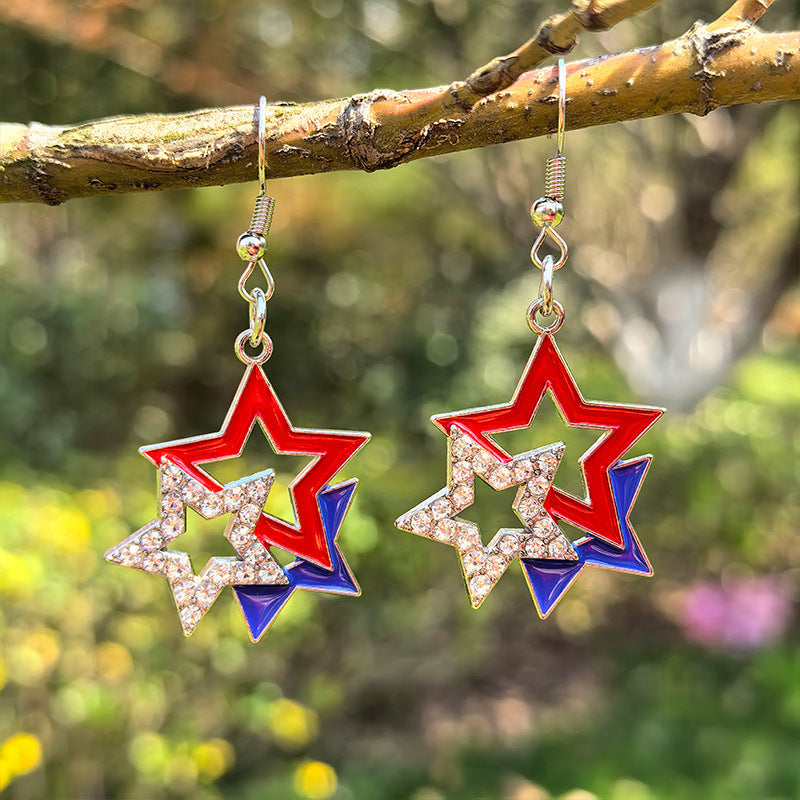Boucles d'oreilles pendantes étoile avec émail et cristaux