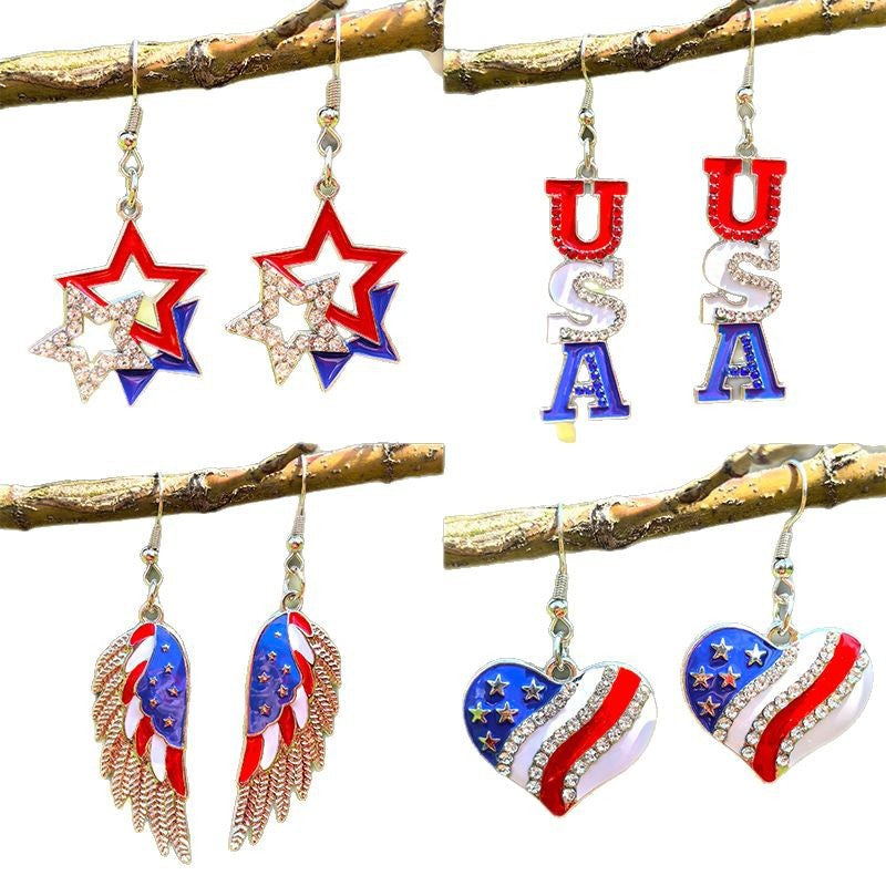 Boucles d'oreilles pendantes étoile avec émail et cristaux