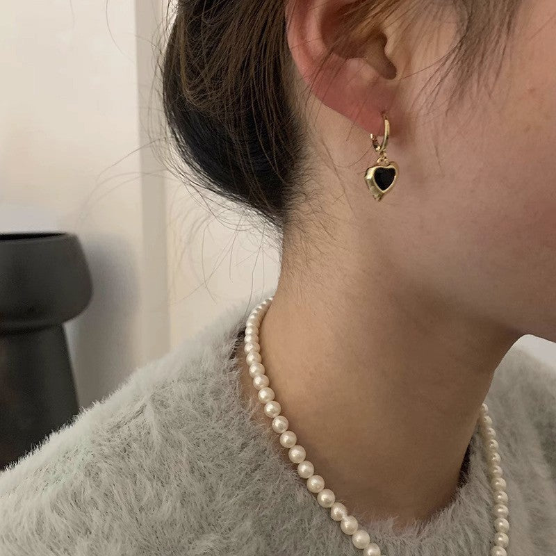 Boucles d'oreilles pendantes pour femme avec cœur et pierre noire