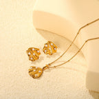 Parure de bijoux pour femme avec pendentif coquillage et zircone