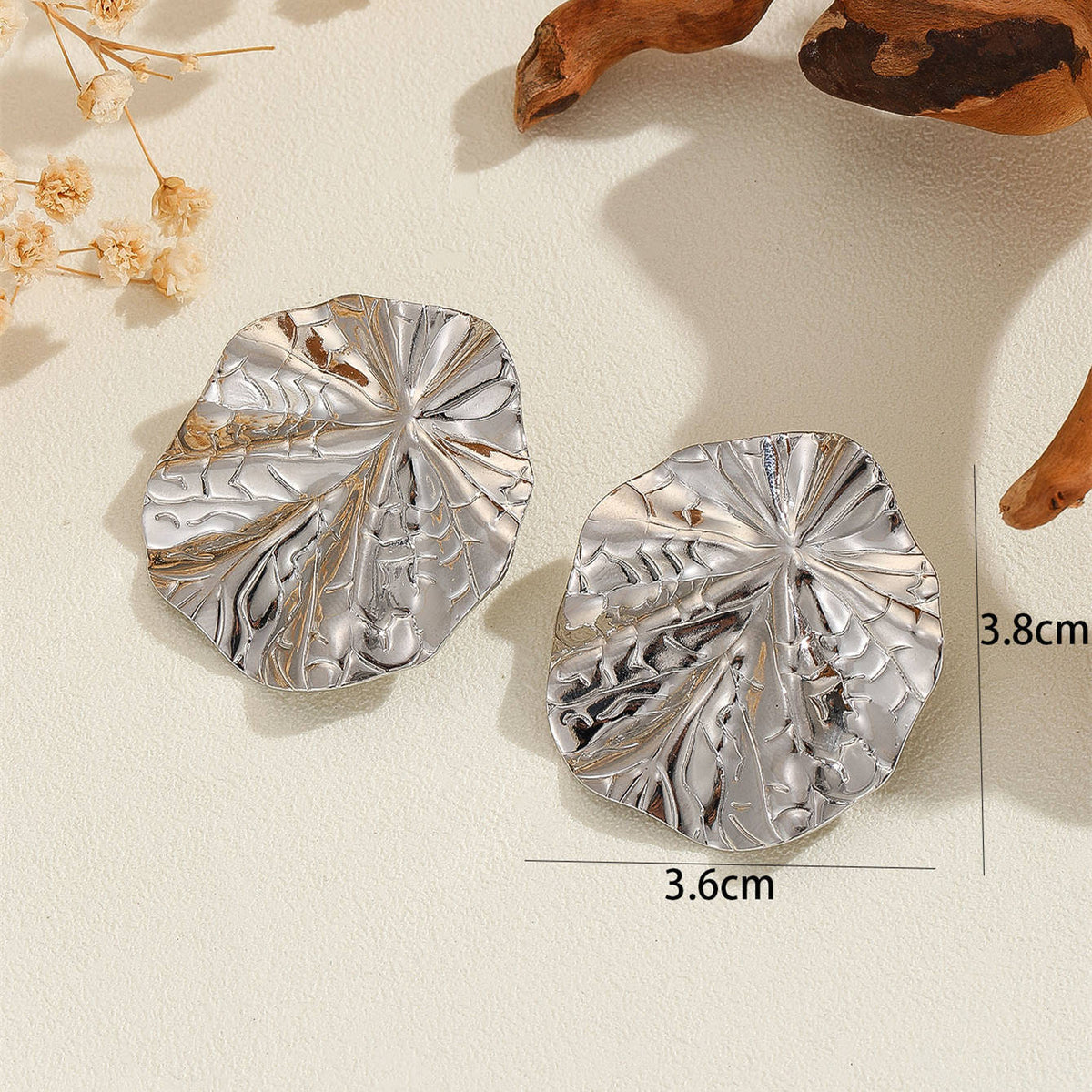 Boucles d'oreilles créateur pour femme en forme de feuille