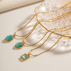 Collier pour femme avec pendentif ovale en acier inoxydable