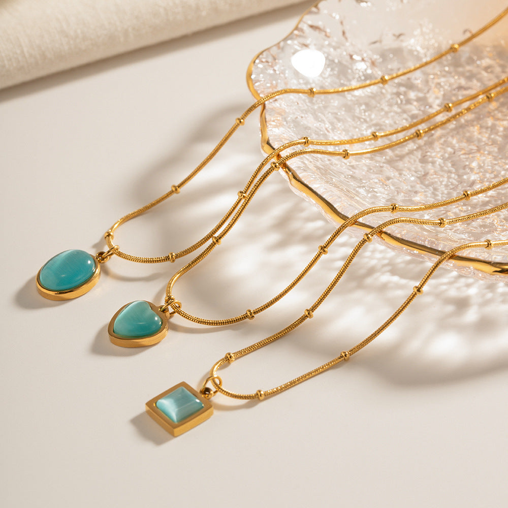 Collier pour femme avec pendentif ovale en acier inoxydable