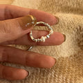 Boucles d'oreilles pour femme avec perles et design en argent