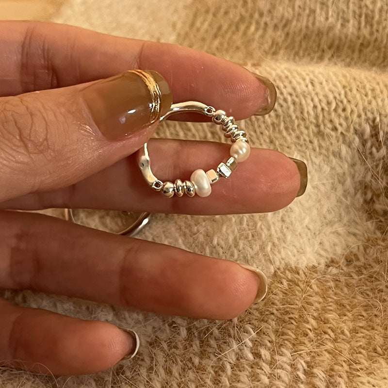 Boucles d'oreilles pour femme avec perles et design en argent