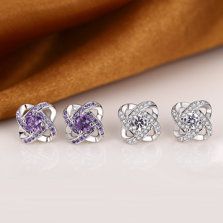 Boucles d'oreilles nœud en cristal étincelant avec insert en zircone