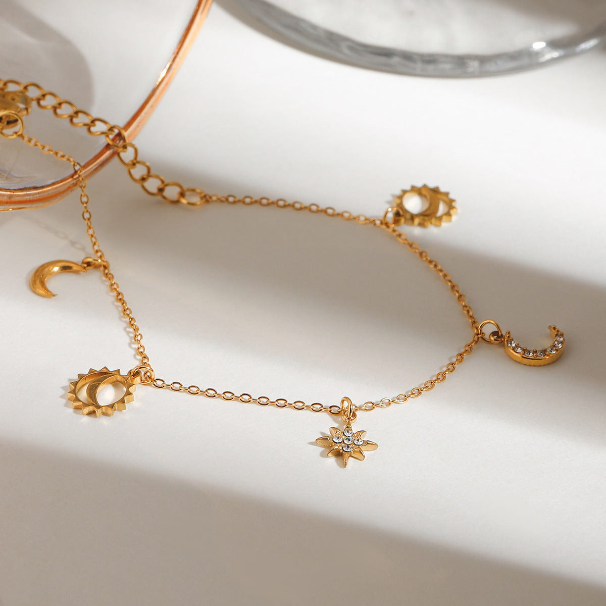 Chevillère pour femme avec breloques soleil et lune en acier inoxydable