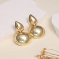 Boucles d'oreilles pour femme au design sculptural moderne