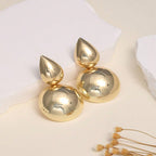 Boucles d'oreilles pour femme au design sculptural moderne