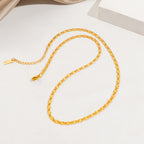 Ensemble collier et bracelet dorés texturés