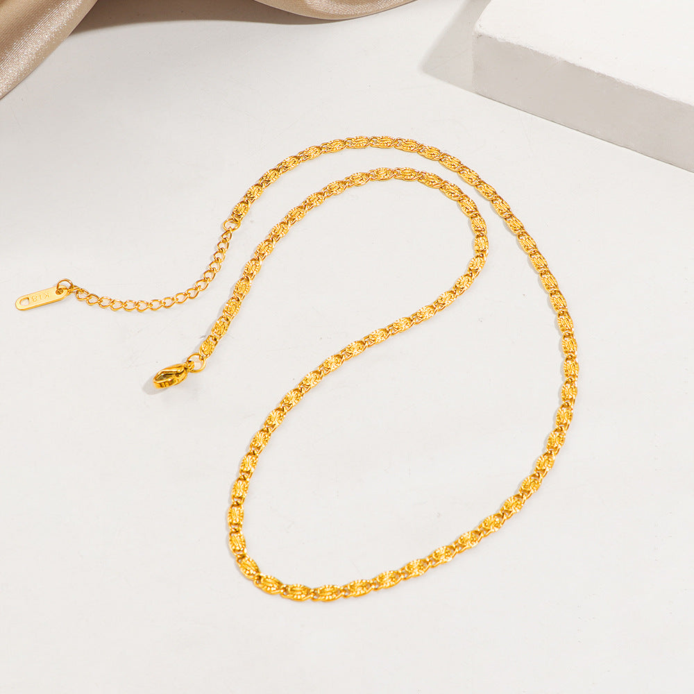 Ensemble collier et bracelet dorés texturés