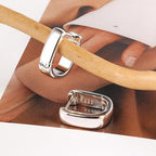 Boucles d'oreilles pour femme au design incurvé moderne