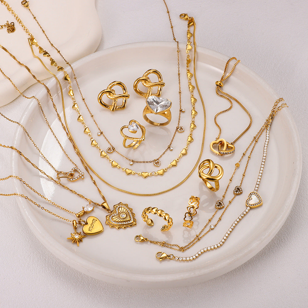 Bracelet pour femme avec fermoir réglable et pendentif en forme de cœur