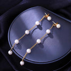 Boucles d'oreilles pendantes chaîne et perles