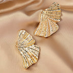 Boucles d'oreilles pour femme design coquillage