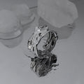 Bague ouverte pour femme au design moderne et torsadé