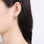 Boucles d'oreilles pour femme en argent au design spiralé moderne
