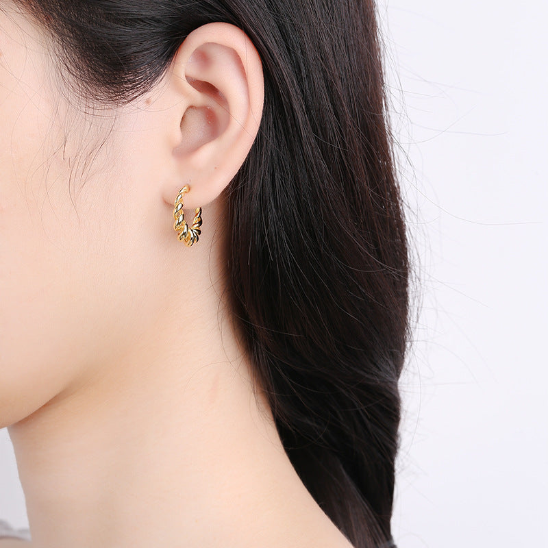 Boucles d'oreilles pour femme en argent au design spiralé moderne