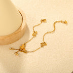 Bracelet délicat pour femme avec papillons et cristaux