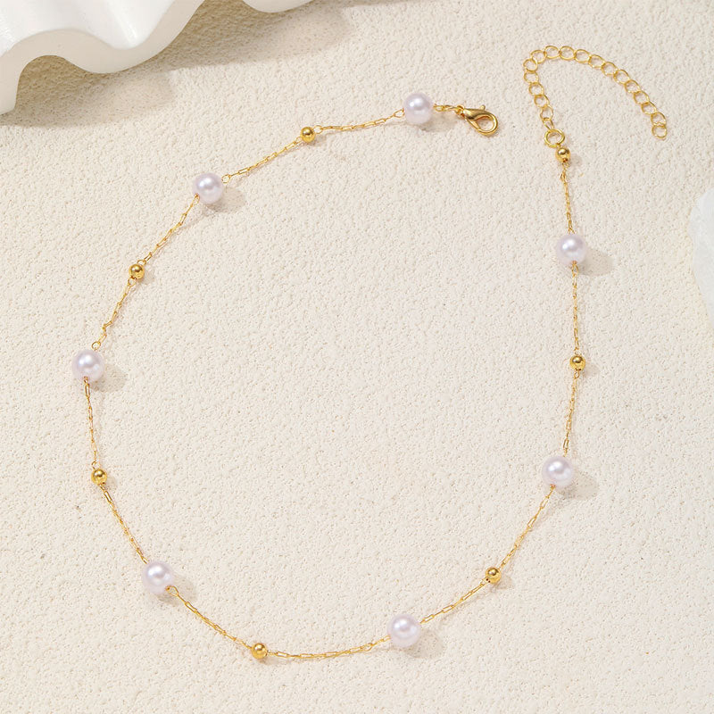 Collier élégant perles et chaîne dorée