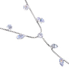Chaîne de cheville délicate avec bague d'orteil intégrée et pendentifs en cristal