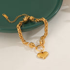 Bracelet pour femme avec pendentif cœur et tresse