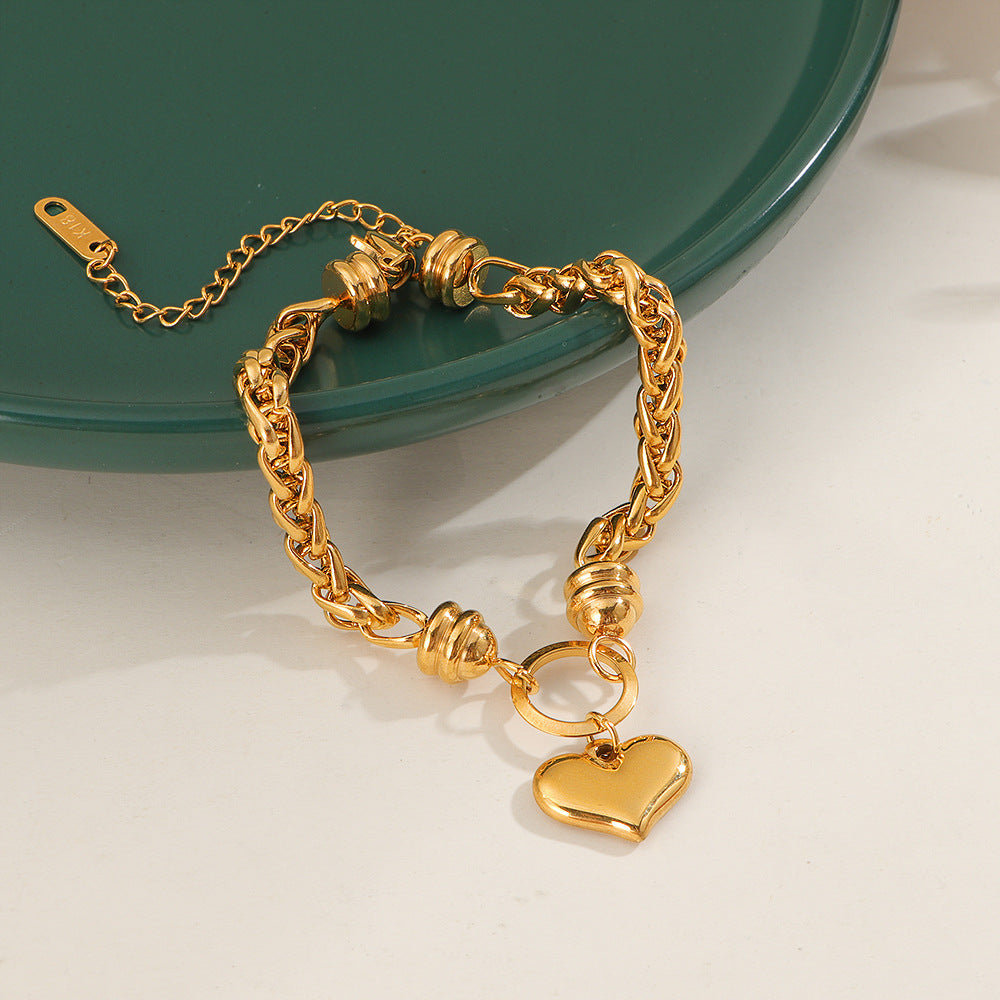 Bracelet pour femme avec pendentif cœur et tresse