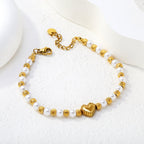 Bracelet pour femme avec pendentif cœur et design perlé luxueux