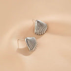 Boucles d'oreilles pendantes sculpturales inspirées des coquillages pour femme